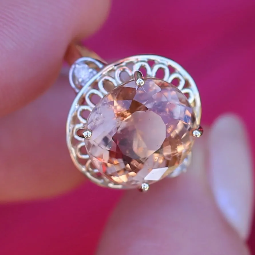 Oval Peach Tourmaline Ring with Pierced Wire Surrounds and Diamonds in the Shoulders, 9ct Yellow Gold, size N or 6.75