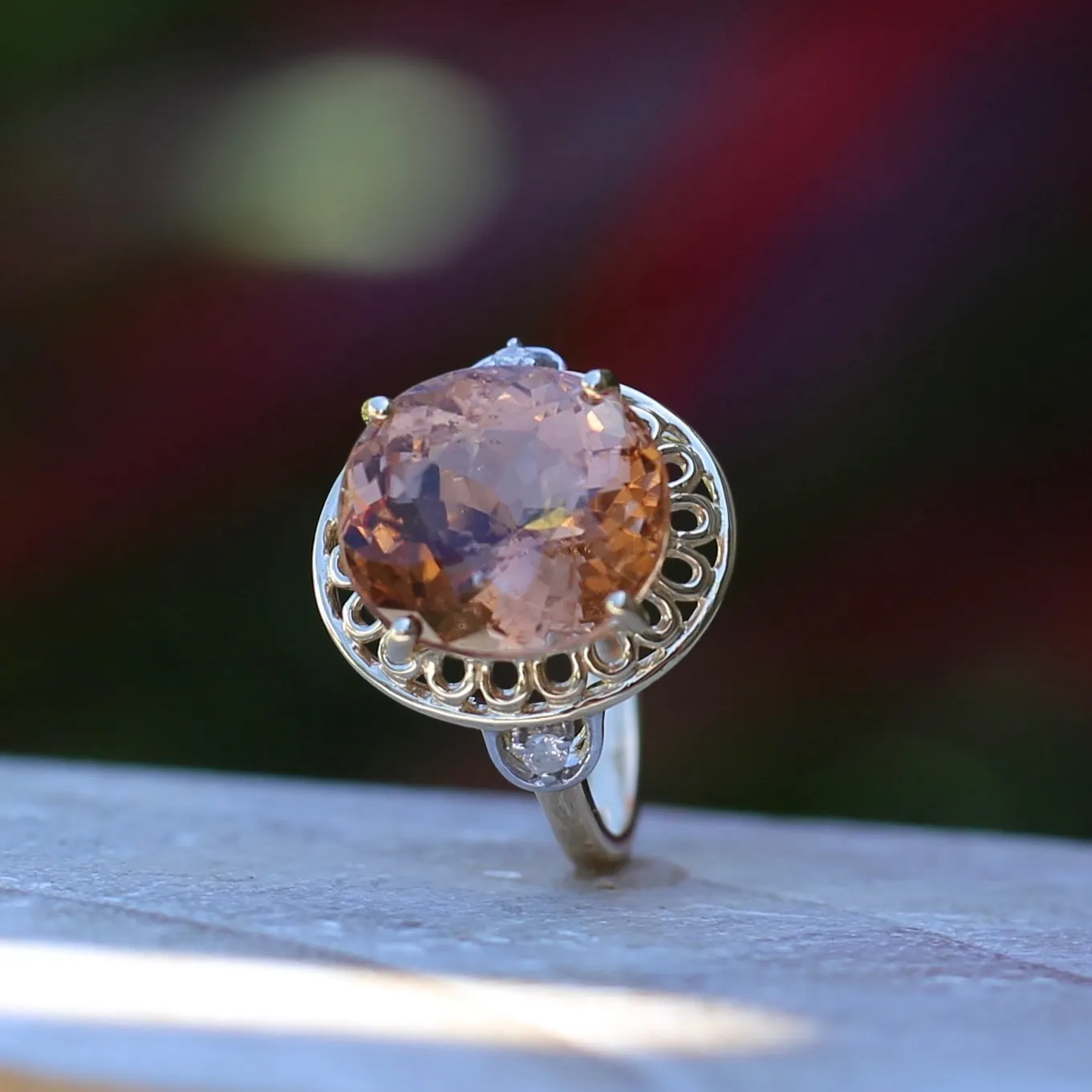 Oval Peach Tourmaline Ring with Pierced Wire Surrounds and Diamonds in the Shoulders, 9ct Yellow Gold, size N or 6.75