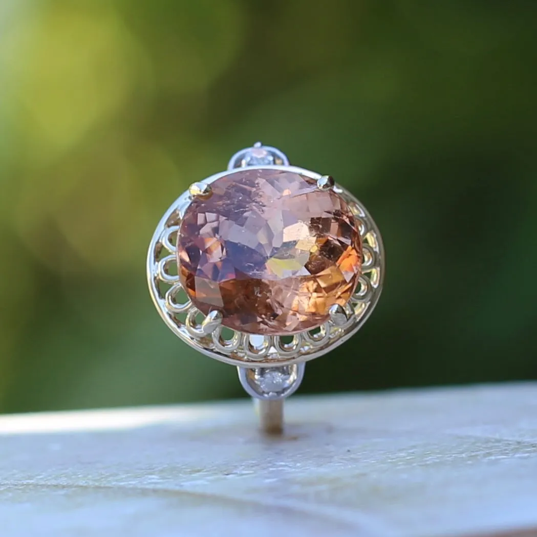 Oval Peach Tourmaline Ring with Pierced Wire Surrounds and Diamonds in the Shoulders, 9ct Yellow Gold, size N or 6.75