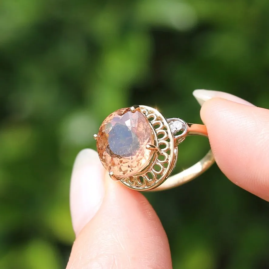 Oval Peach Tourmaline Ring with Pierced Wire Surrounds and Diamonds in the Shoulders, 9ct Yellow Gold, size N or 6.75