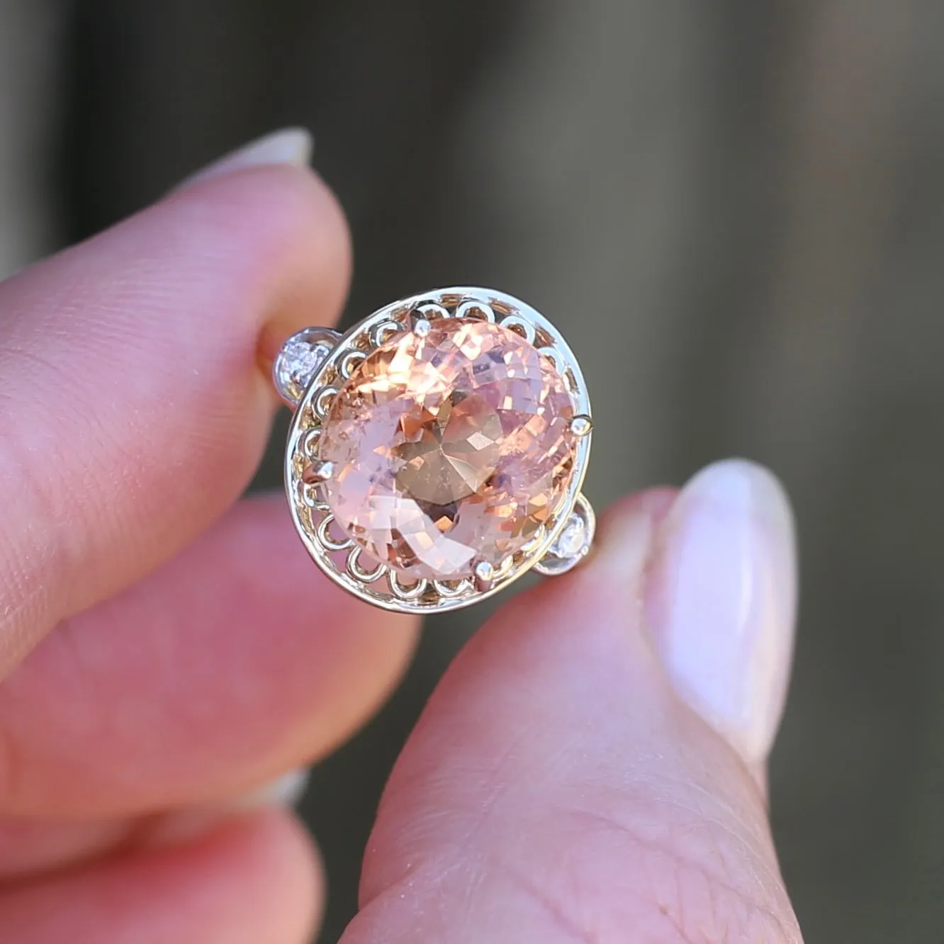 Oval Peach Tourmaline Ring with Pierced Wire Surrounds and Diamonds in the Shoulders, 9ct Yellow Gold, size N or 6.75