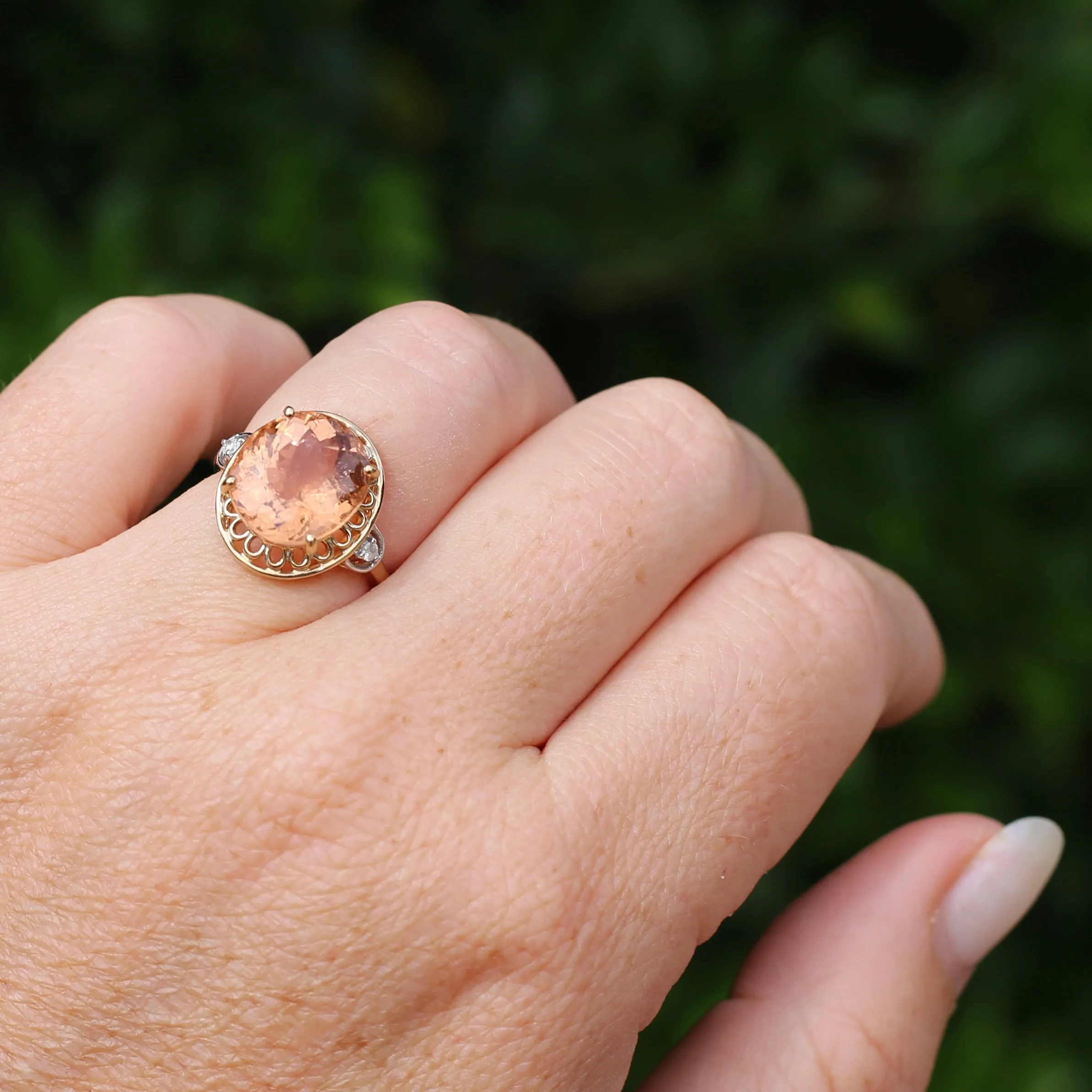 Oval Peach Tourmaline Ring with Pierced Wire Surrounds and Diamonds in the Shoulders, 9ct Yellow Gold, size N or 6.75