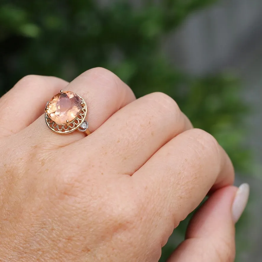 Oval Peach Tourmaline Ring with Pierced Wire Surrounds and Diamonds in the Shoulders, 9ct Yellow Gold, size N or 6.75