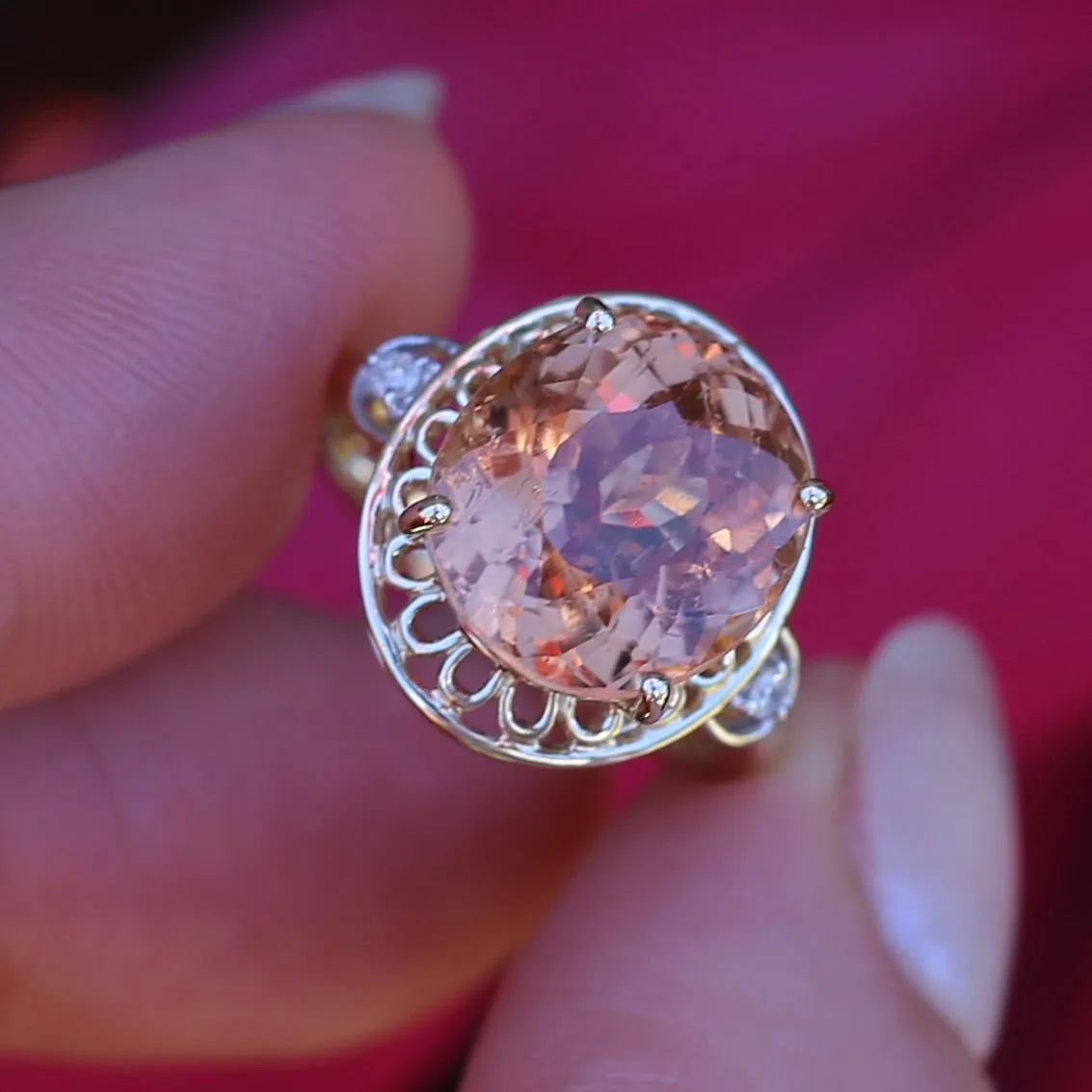 Oval Peach Tourmaline Ring with Pierced Wire Surrounds and Diamonds in the Shoulders, 9ct Yellow Gold, size N or 6.75