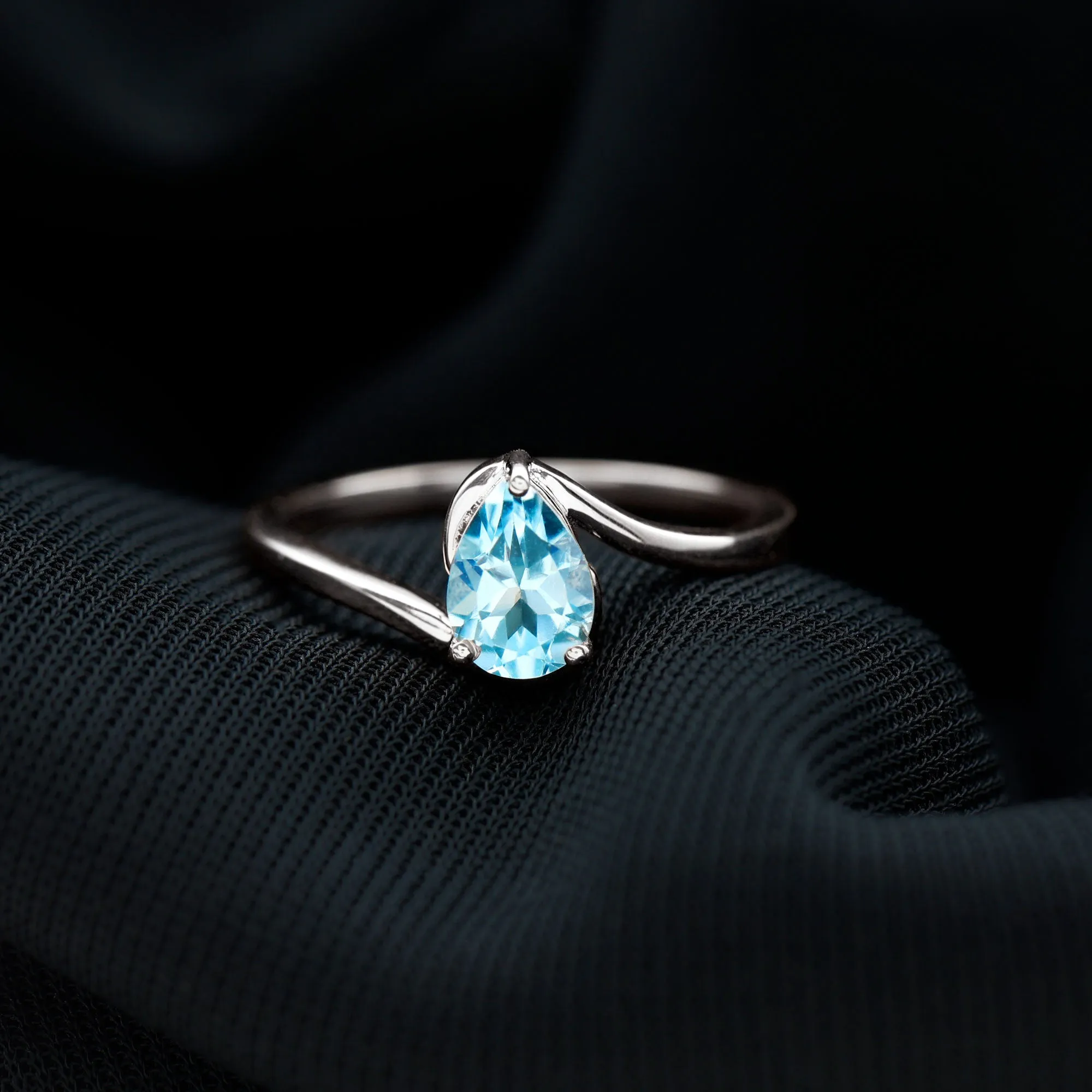 Pear Cut Sky Blue Topaz Solitaire Bypass Ring