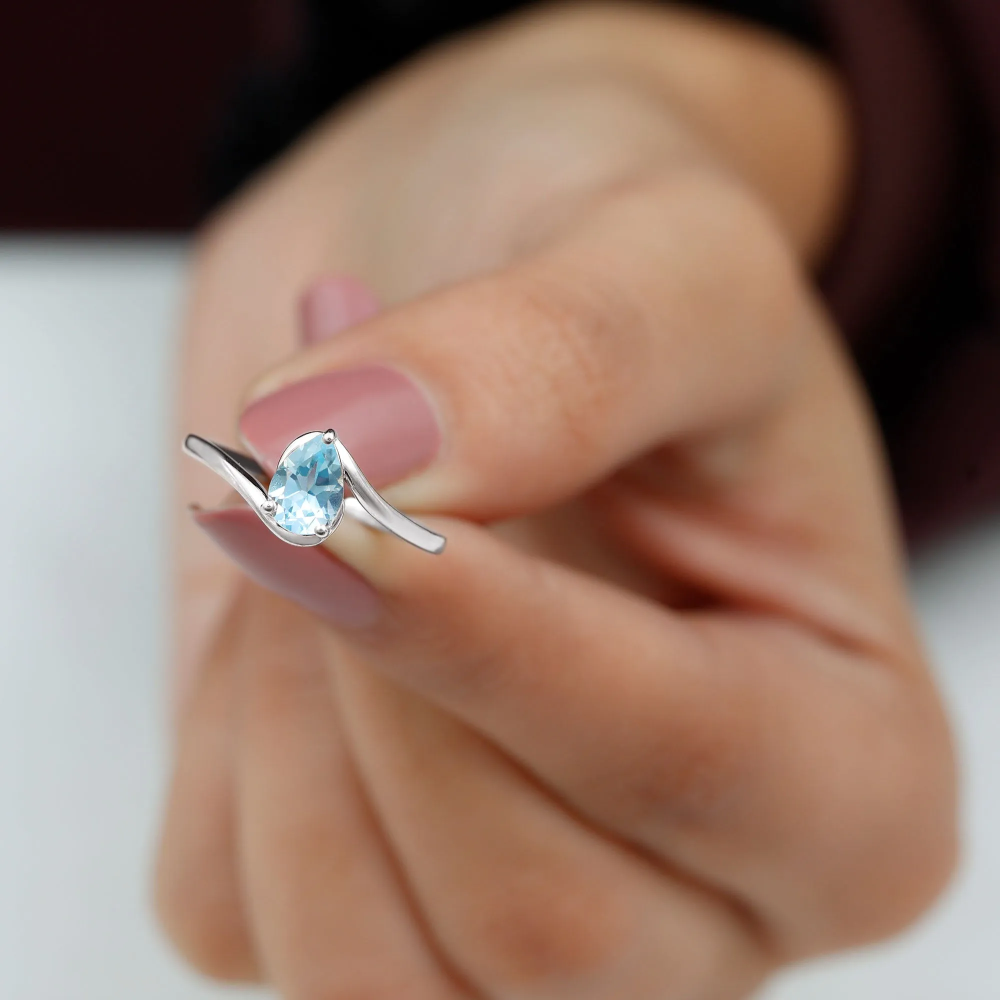 Pear Cut Sky Blue Topaz Solitaire Bypass Ring