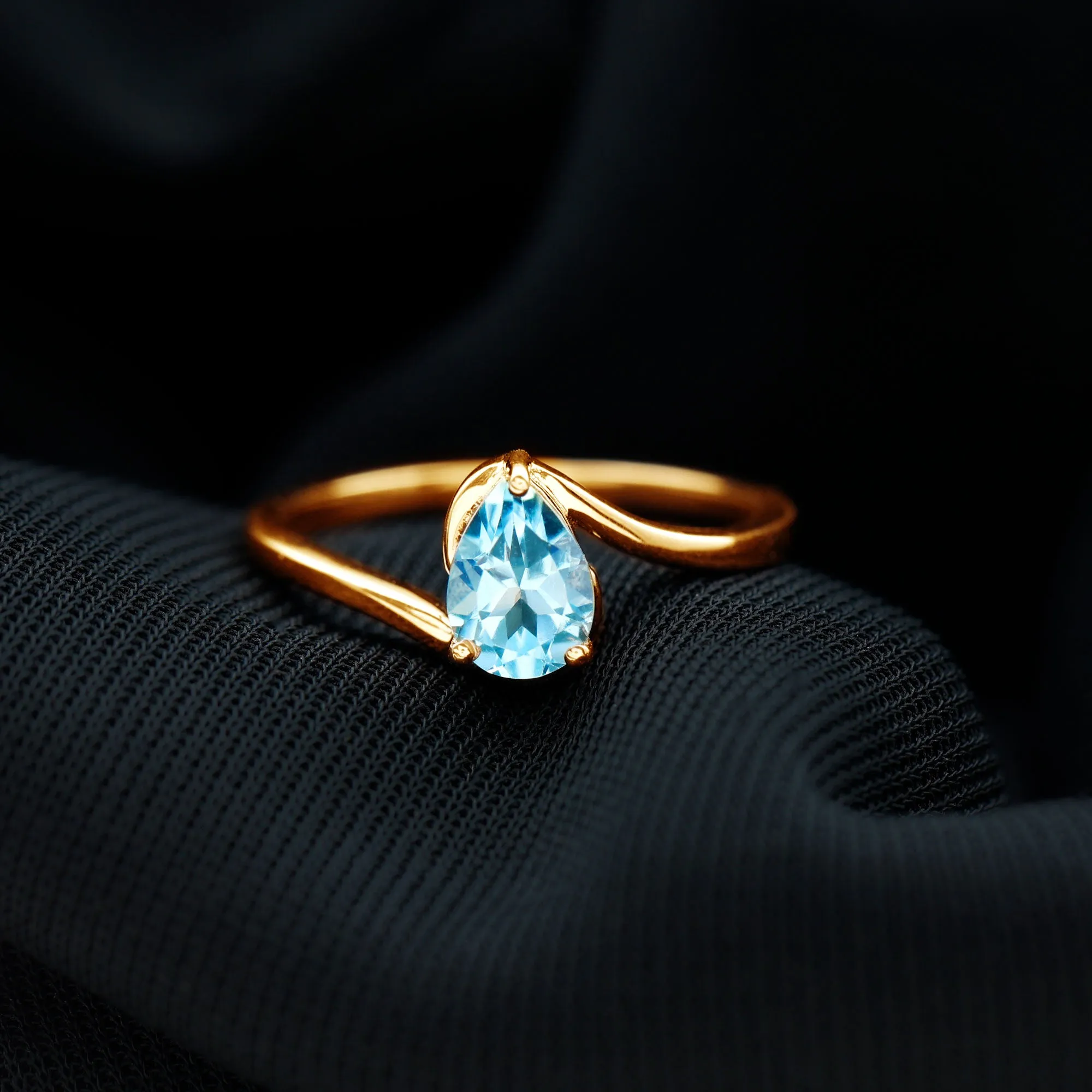 Pear Cut Sky Blue Topaz Solitaire Bypass Ring