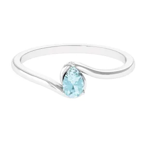 Pear Cut Sky Blue Topaz Solitaire Bypass Ring