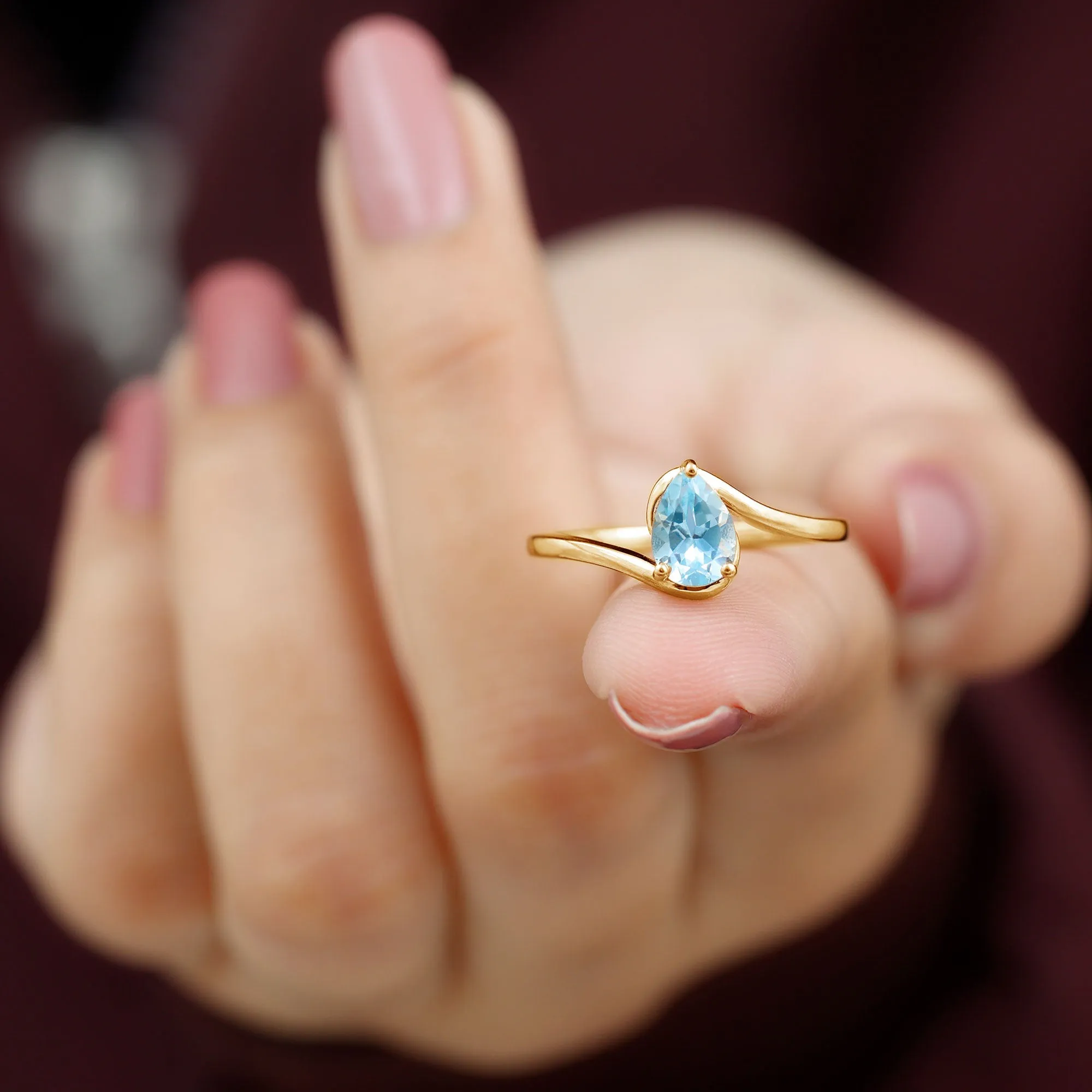 Pear Cut Sky Blue Topaz Solitaire Bypass Ring